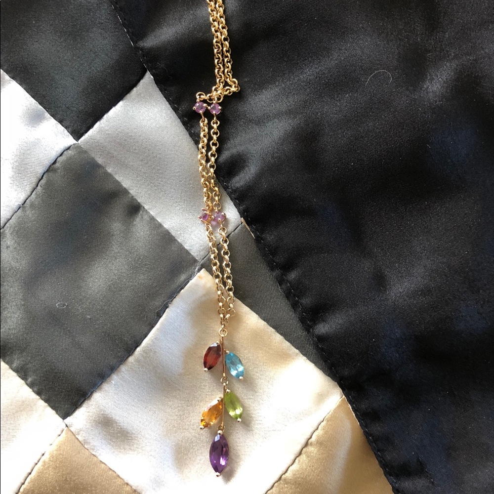 Gemstone necklace stamped §§10k